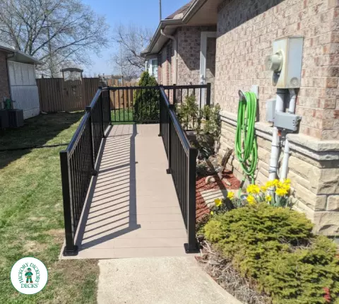 Timbertech custom ramp with aluminum railings in Welland