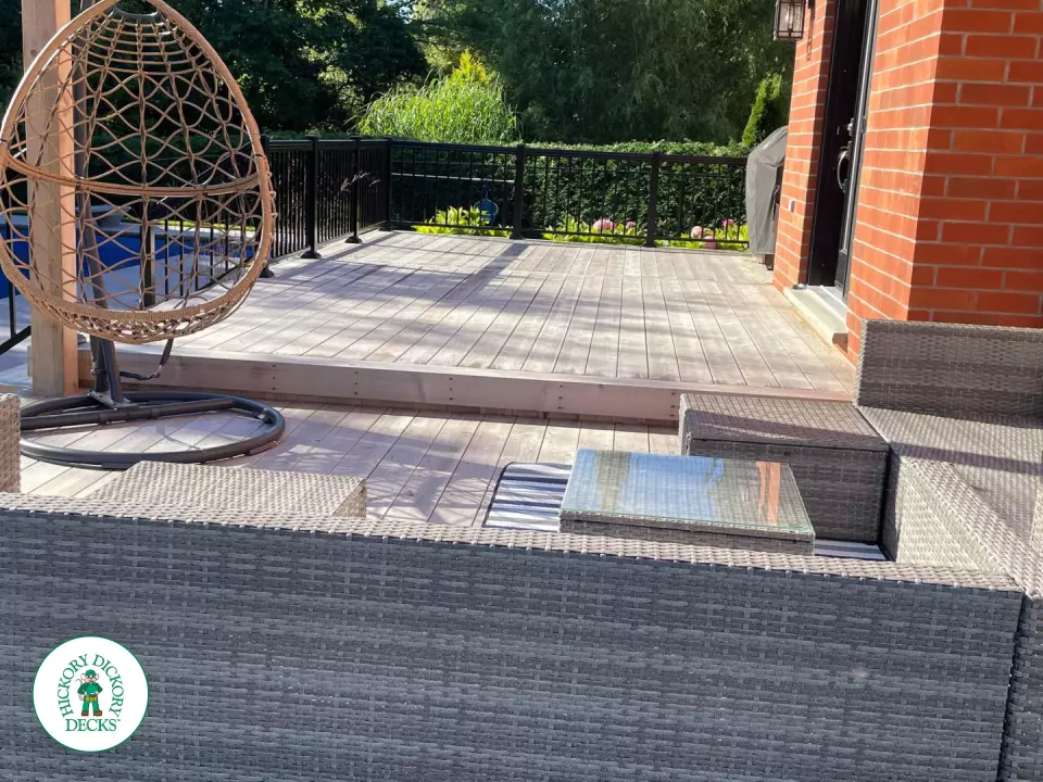 Walkout cedar deck with cedar pergola