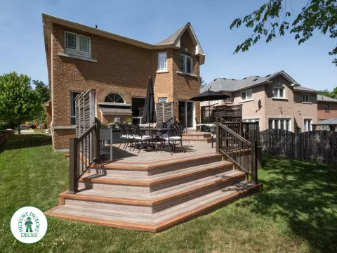 Zuri deck with floor pattern, built in ights and privacy screens in Richmond Hill