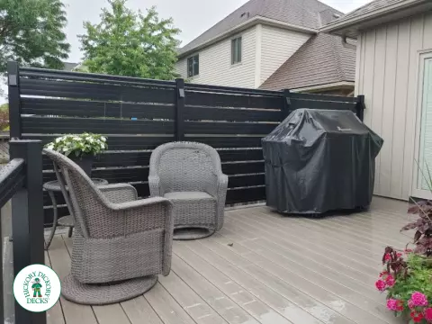 Clubhouse deck with privacy screens and lights in St. Catharines