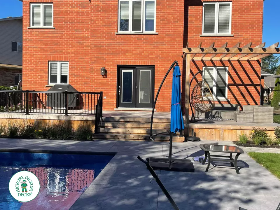 Walkout cedar deck with cedar pergola