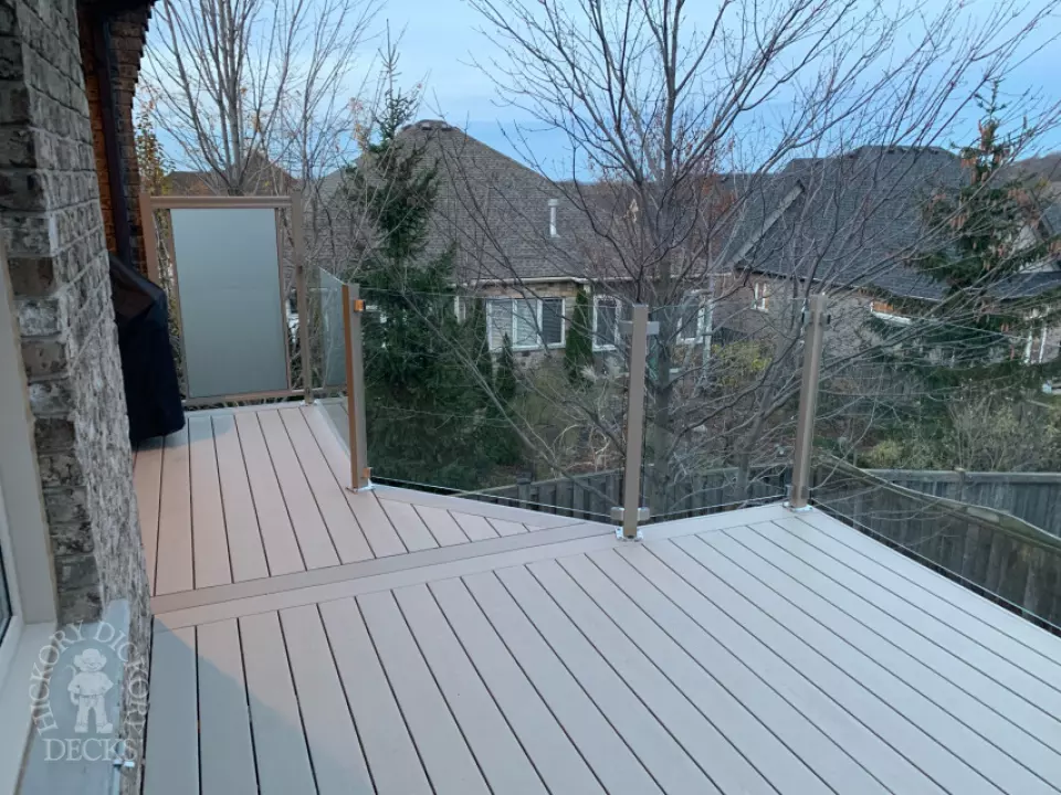 Clubhouse high deck with glass rail and privacy in Niagara