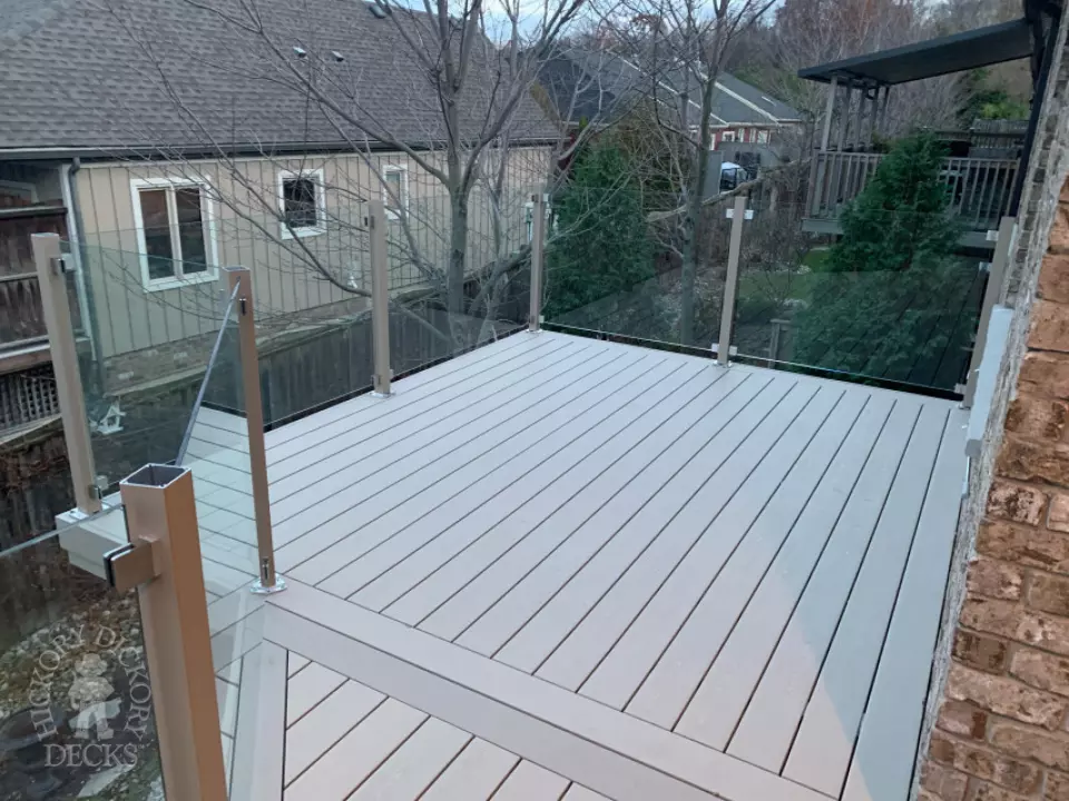 Clubhouse high deck with glass rail and privacy in Niagara