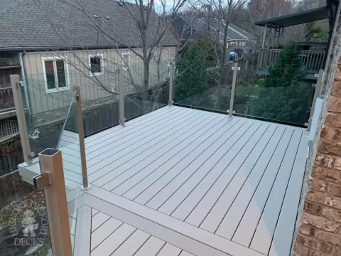 Clubhouse high deck with glass rail and privacy in Niagara