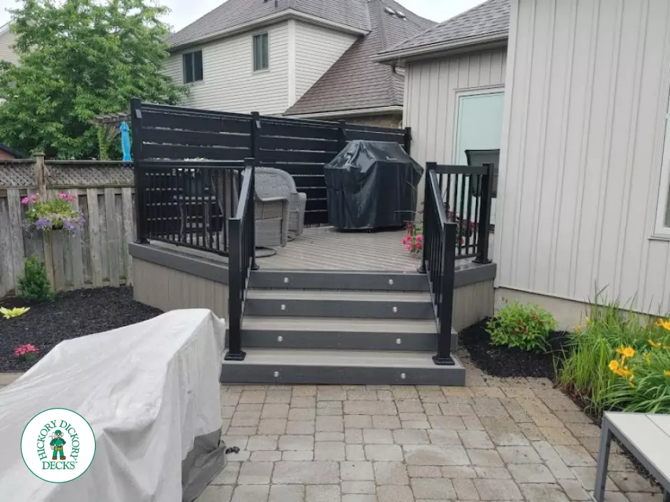 Clubhouse deck with privacy screens and lights in St. Catharines