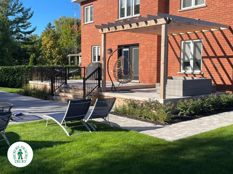 Walkout cedar deck with cedar pergola