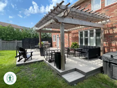 Clubhouse hot tub deck with built in lights pergola and privacy screens