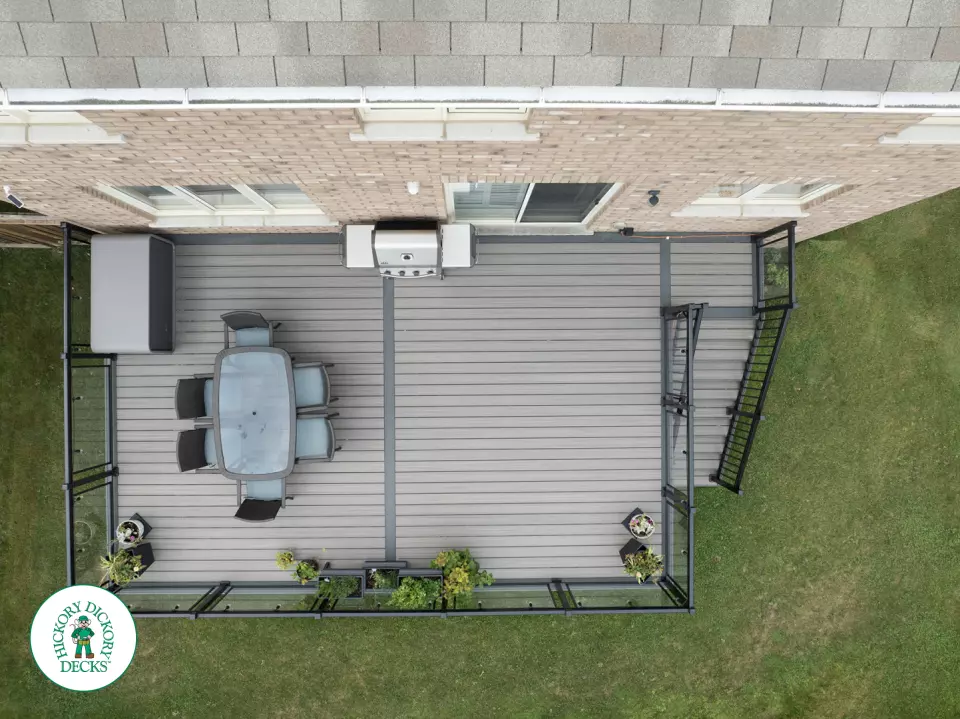 Elevated trex deck with glass railings and stairs in Brampton Elevated trex deck with glass railings and stairs in Brampton