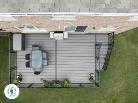 Elevated trex deck with glass railings and stairs in Brampton Elevated trex deck with glass railings and stairs in Brampton