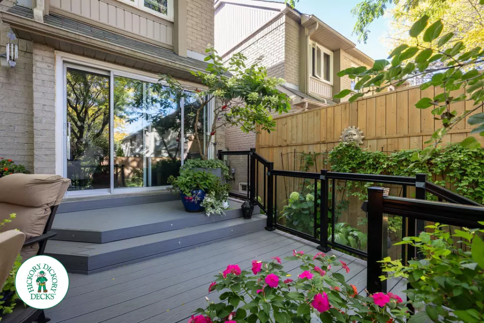 Fiberon deck with glass railing and lights in Mississauga