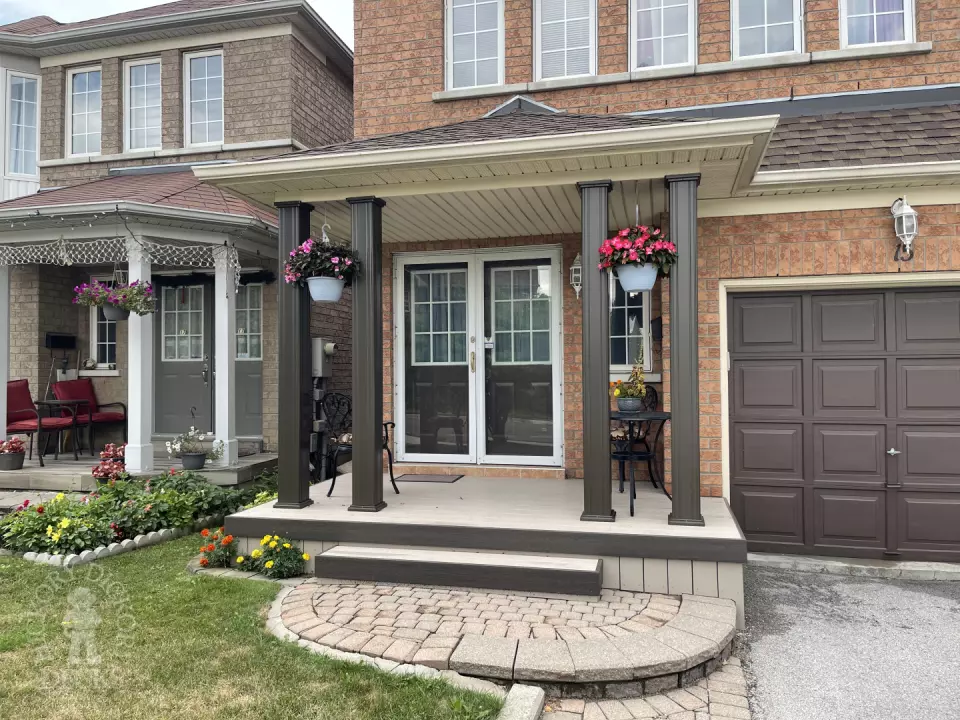 Small light brown front porch  with dark brown trim