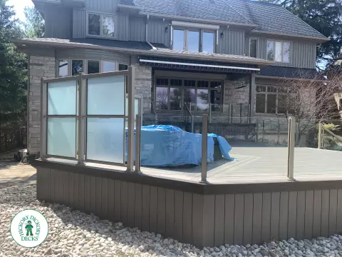 Clubhouse deck with glass railings in Mississauga