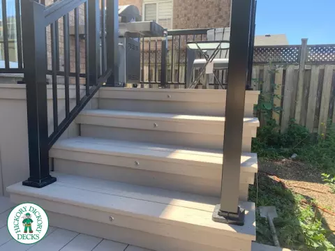 2 level composite deck with black aluminum railing