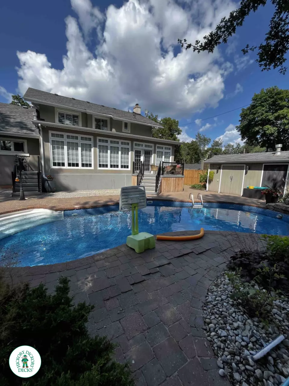 Small grey fiberon deck with black aluminum railing