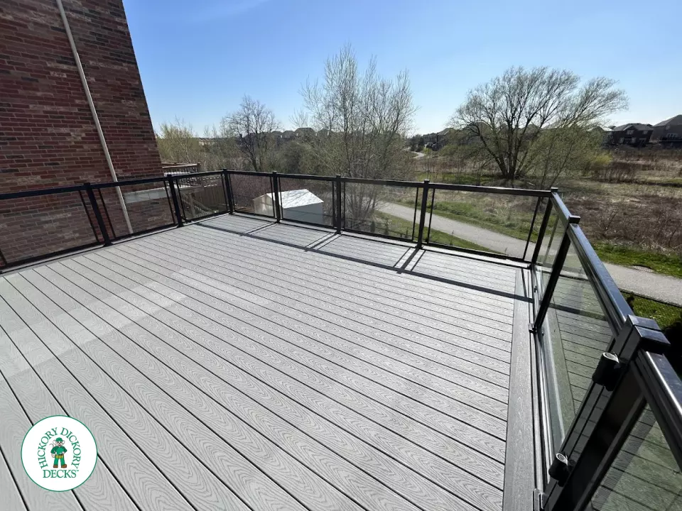 Trex high deck with glass railings in Brampton
