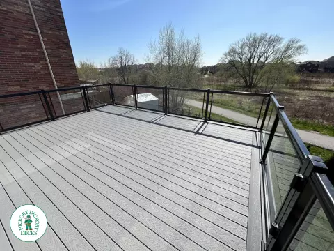 Trex high deck with glass railings in Brampton