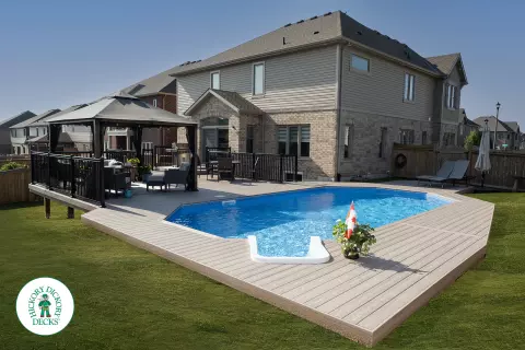 1000 square foot composite pool deck in grey shade.