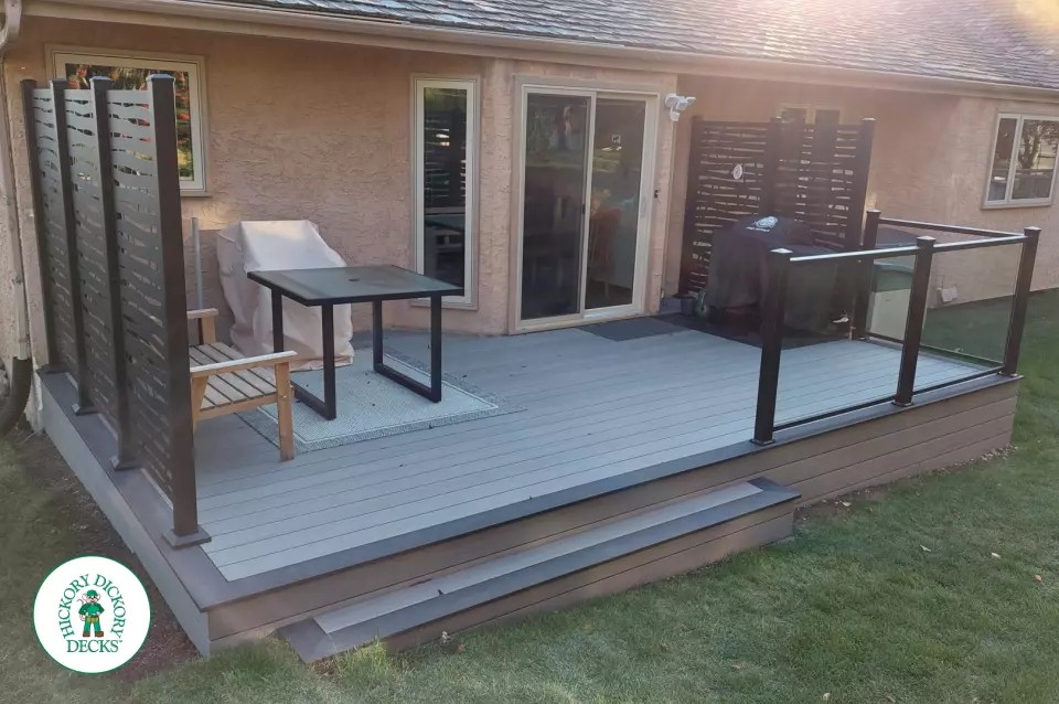 Timbertech deck in Calgary with privacy and glass rail