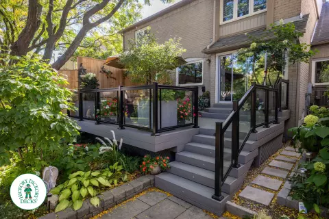 Fiberon deck with glass railing and lights in Mississauga