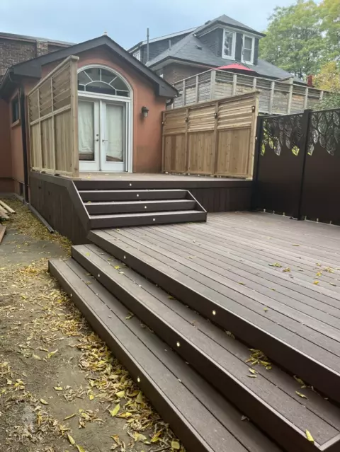Armadillo deck with privacy screens and lights in Toronto