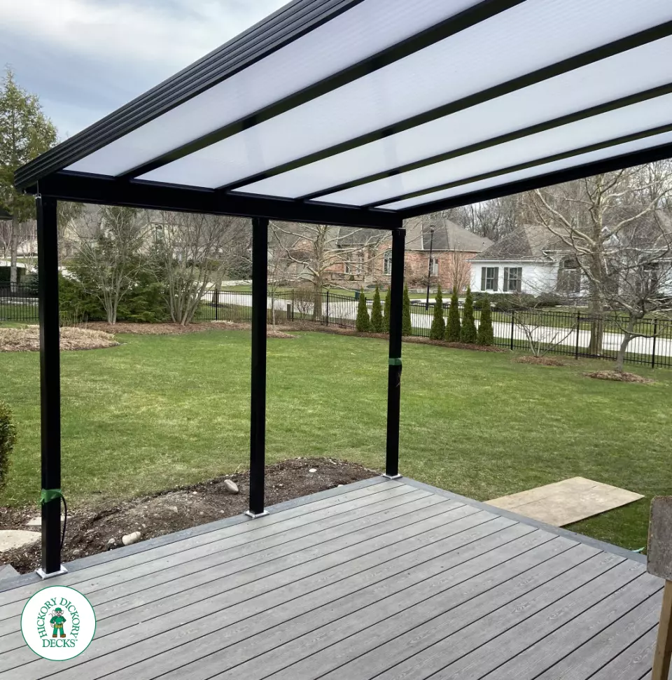 Clubhouse deck with aluminum railings, lights and custom roof in London Ontario