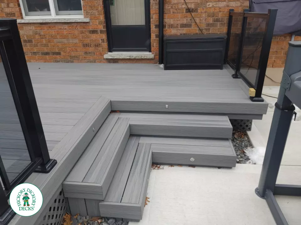 Fiberon low deck with glass railings in Welland