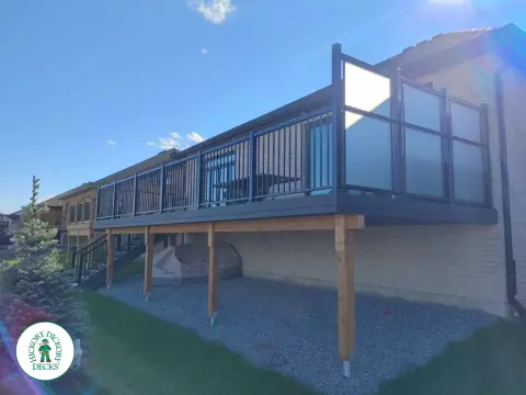 Clubhouse high deck with privacy screens in Welland