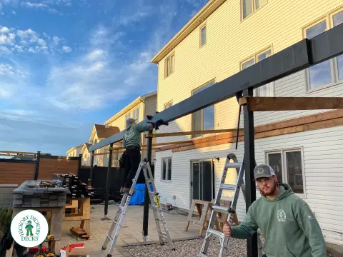 Clubhouse high deck with privacy and glass railings in Ottawa