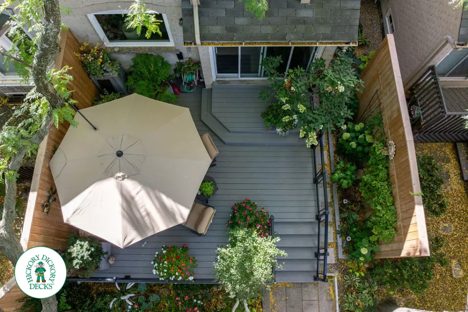 Fiberon deck with glass railing and lights in Mississauga