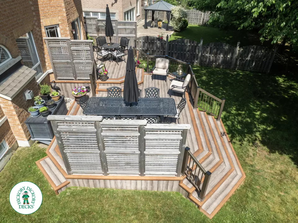 Zuri deck with floor pattern, built in ights and privacy screens in Richmond Hill