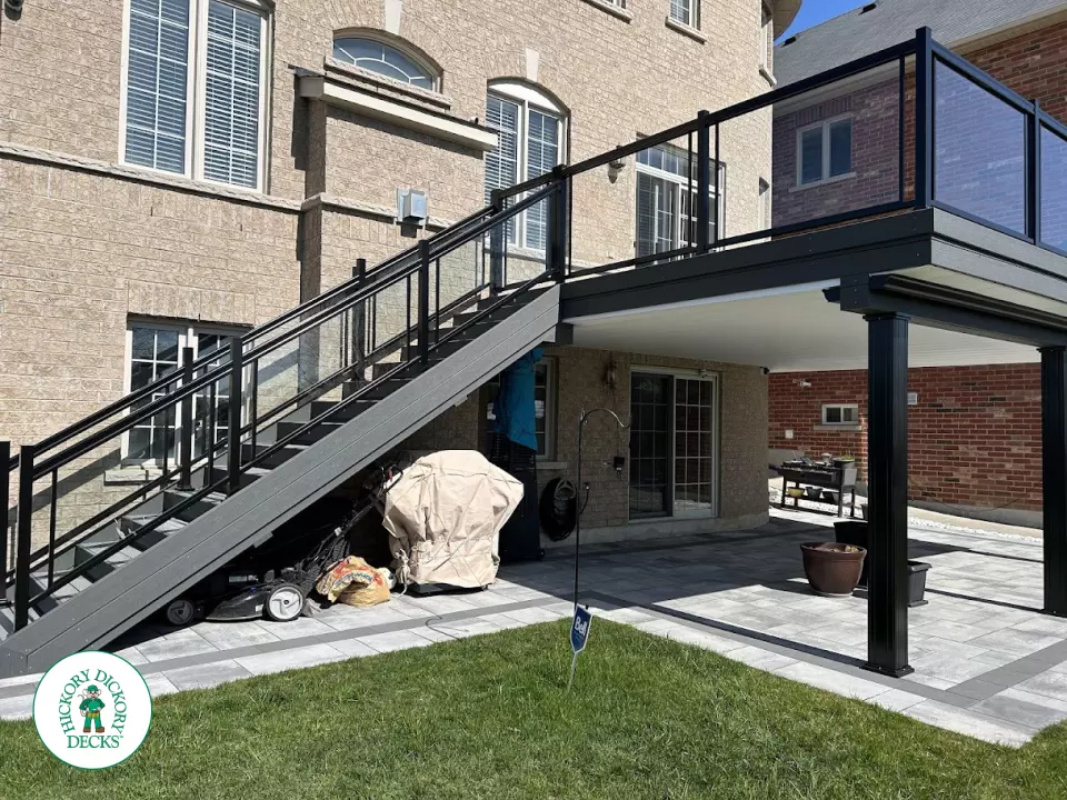 Trex high deck with glass railings in Brampton