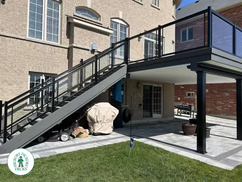 Trex high deck with glass railings in Brampton