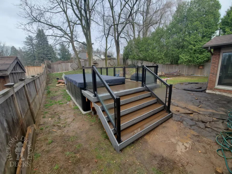 Small hot tub deck with lights in Ancaster