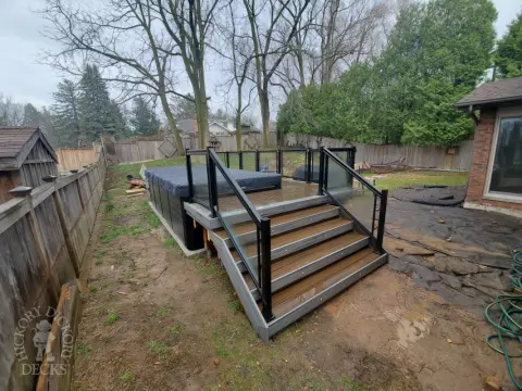 Small hot tub deck with lights in Ancaster