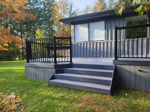 TruNorth deck with aluminum railing and lights in Brampton