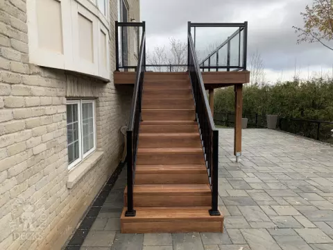 Zuri high deck with glass railings and stairs in Oakville Zuri high deck with glass railings and stairs in Oakville