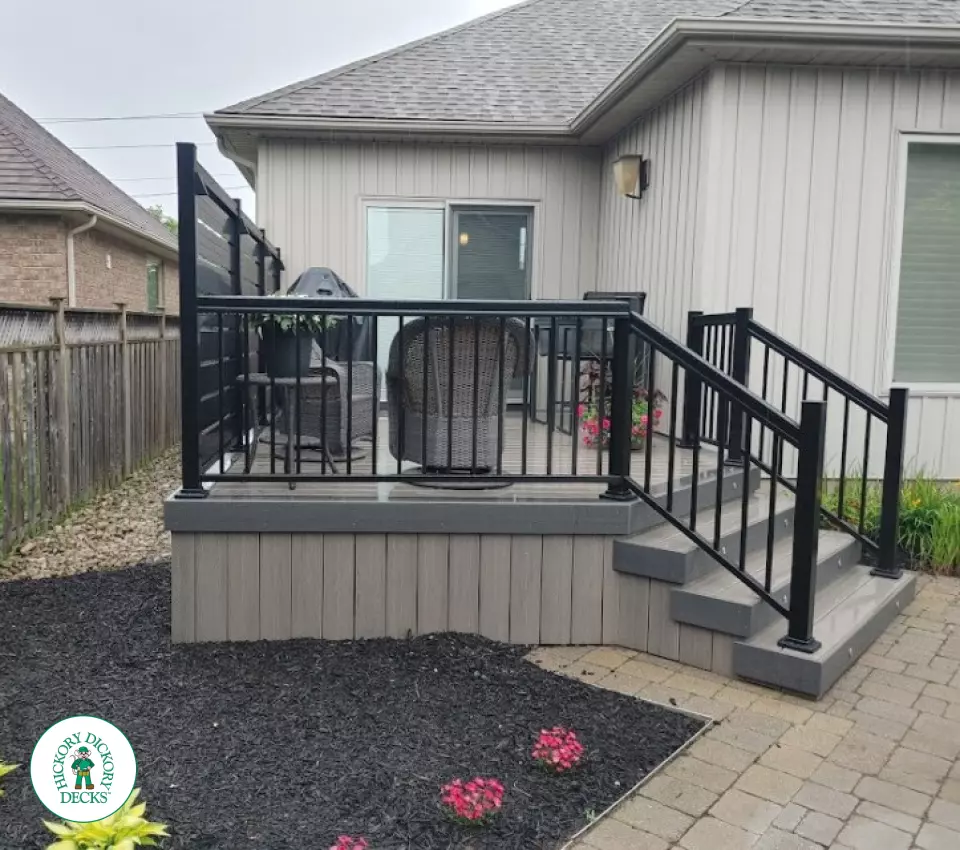 Clubhouse deck with privacy screens and lights in St. Catharines