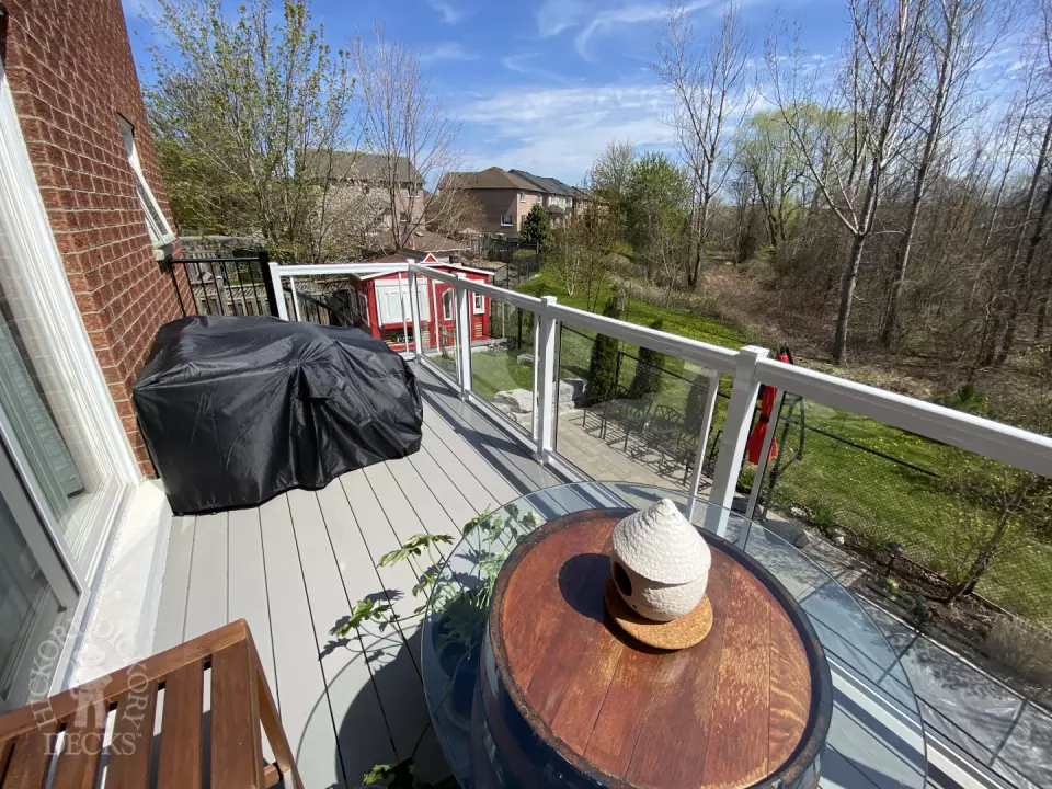 High clubhouse deck with glass railing