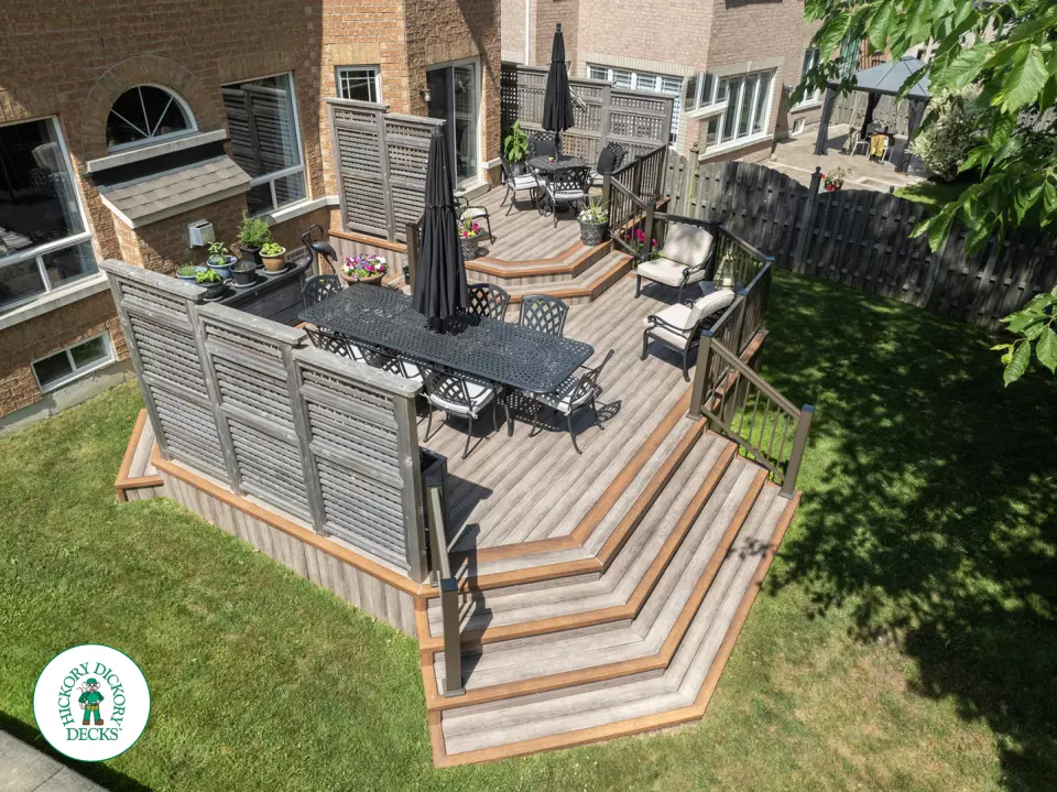 Zuri deck with floor pattern, built in ights and privacy screens in Richmond Hill