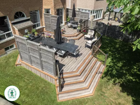 Zuri deck with floor pattern, built in ights and privacy screens in Richmond Hill