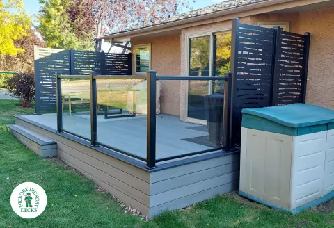 Timbertech deck in Calgary with privacy and glass rail