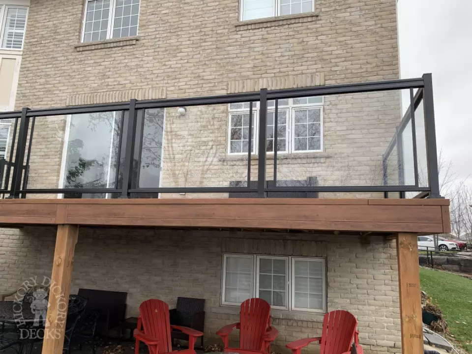Zuri high deck with glass railings and stairs in Oakville Zuri high deck with glass railings and stairs in Oakville