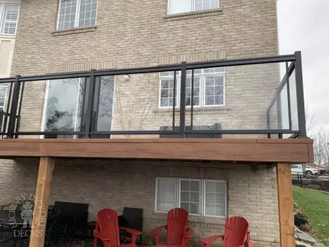 Zuri high deck with glass railings and stairs in Oakville Zuri high deck with glass railings and stairs in Oakville