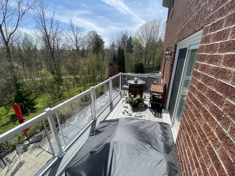 High clubhouse deck with glass railing