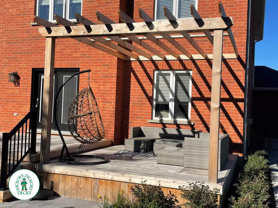 Walkout cedar deck with cedar pergola