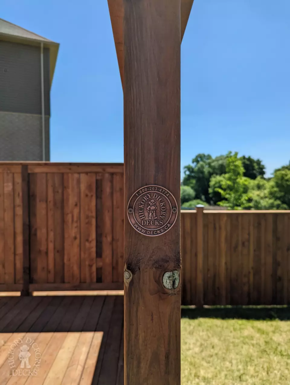 Pressure treated deck with pressure treated privacy screens and fence.