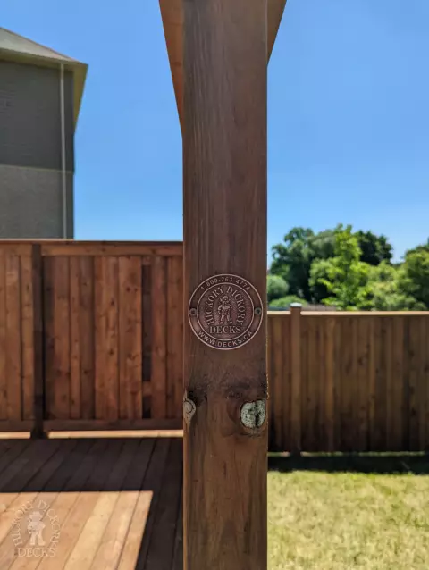 Pressure treated deck with pressure treated privacy screens and fence.