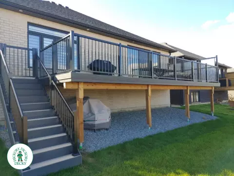 Clubhouse high deck with privacy screens in Welland