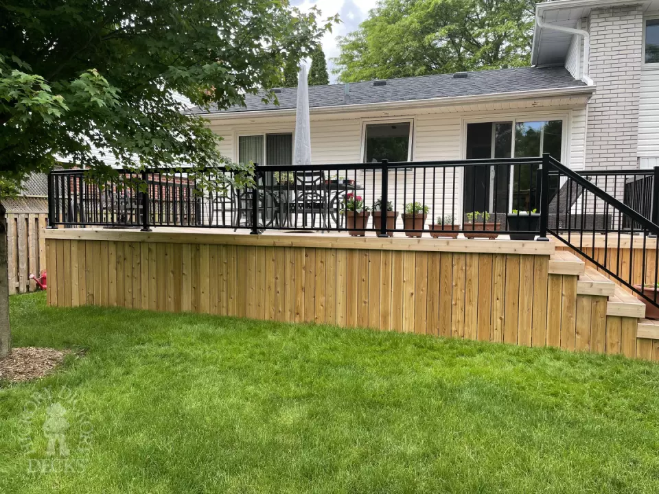 315 square foot cedar deck with lighting system in stairs.