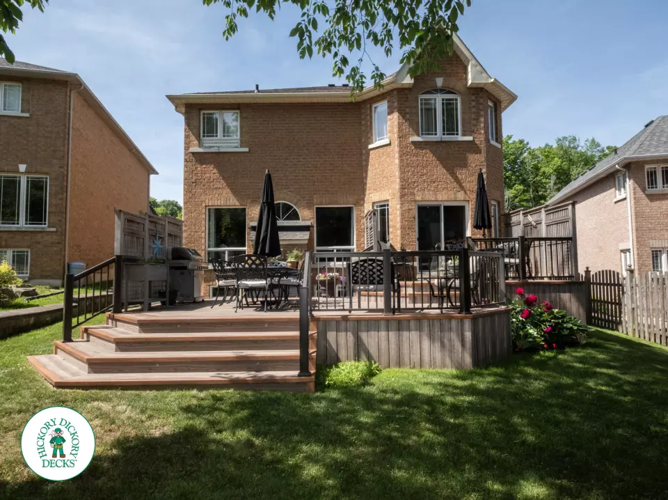 Zuri deck with floor pattern, built in ights and privacy screens in Richmond Hill